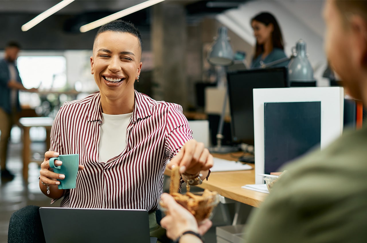 A happy employee has fun in the office